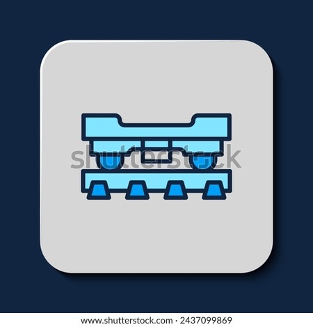 Filled outline Cargo train wagon icon isolated on blue background. Freight car. Railroad transportation.  Vector