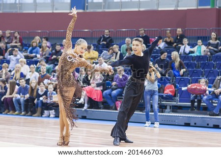 MINSK, BELARUS - FEB 23: Unidentified Dance Couple Performs Youth-2 Latin-American Program on Open Minsk WDSF Championship 2014 on February, 23, 2014, in Minsk, Republic of Belarus