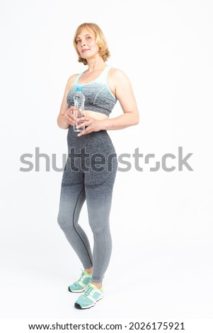 Similar – Image, Stock Photo Senior woman in sportswear jogging through the forest