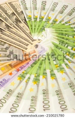 Circular Placement of American and  European Currencies. Vertical Image