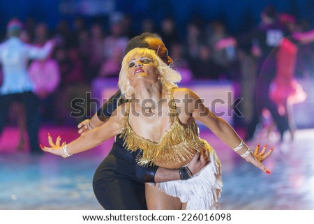 Minsk-Belarus, October 18, 2014: Unidentified Dance Couple Performs Adult Latin-American Program on on IDSA World Open Championship 2014 in October 18, 2014, in Minsk, Republic of Belarus