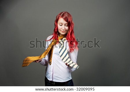 pretty woman selecting tie isolated