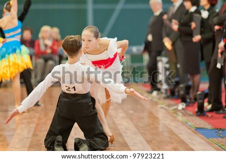 MINSK-BELARUS, MARCH 4: an Unidentified Junior Dance Couple performs juvenile Standard Program on The Republic of Belarus WDSF Championship, 2 Stage, on March 4, 2012 in Minsk, The Republic of Belarus