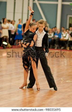 MINSK-BELARUS, MARCH 4: an Unidentified teenage Dance Couple performs Junior-2 Latin-American Program on The Republic of Belarus WDSF Championship, 2 Stage, on March 4, 2012,Minsk,Republic of Belarus