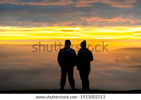 Similar – Image, Stock Photo Anonymous man enjoying mountain landscape and lake