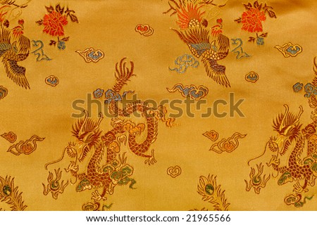 Oriental background with embroidered ornament.
