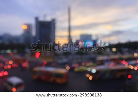 Blurred Background of Traffic Jam  at Public Victory Monument in Bangkok Thailand in sunset.
