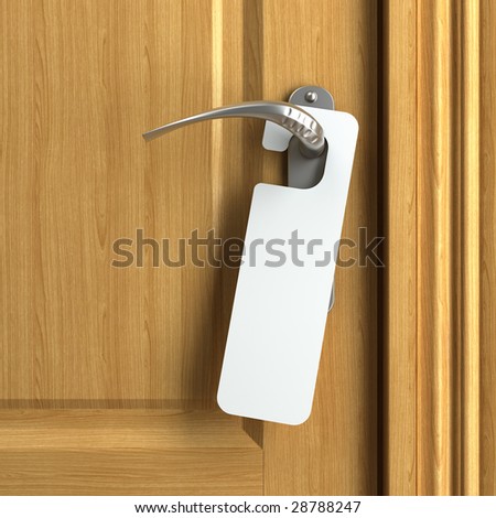 white card hanging from doorknob with copy space where you can put your own text
