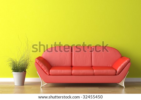 interior design of a modern red couch on green wall