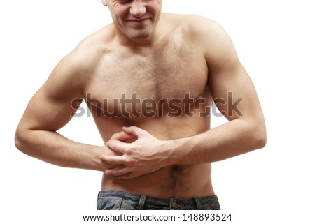 young man holding his stomach from liver or kidney pain