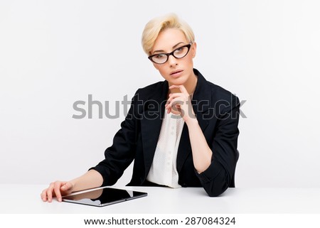 Young beautiful caucasian business woman wearing jacket studio portrait