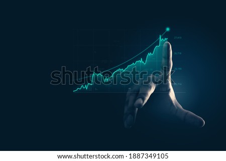 Businessman pointing chart financial goals and economic business planning global.