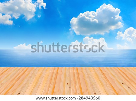 Blue sea backgrounds. Sea backdrops. Wood plank on sea backgrounds. Blank wood plank table. Blue sea and cloudy sky. Wooden plank backgrounds. Travel backgrounds. Tour backgrounds. Relax backgrounds.