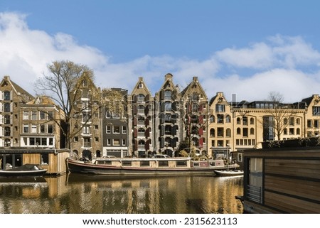 Similar – Image, Stock Photo Reflection of some dwellings in a shop window with inscription a vendre