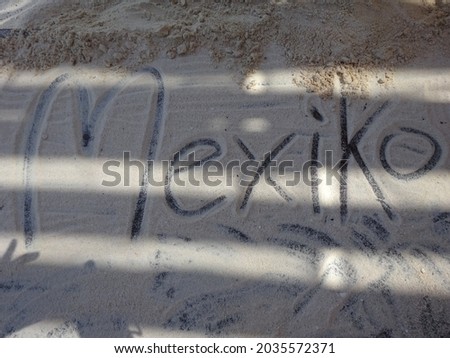 lettering 'Mexiko' in the sand Stock fotó © 