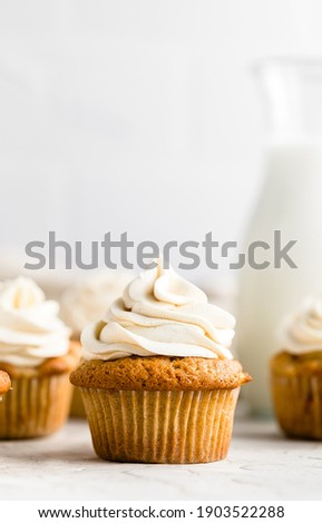 Apple Cupcakes with Maple Buttercream Frosting: soft, fluffy, moist cupcakes filled with tender apples and cozy spices and topped with a creamy maple buttercream frosting.