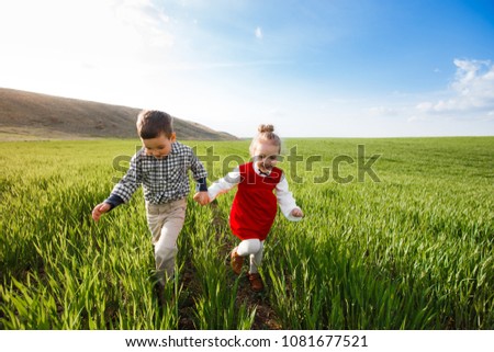 Similar – Image, Stock Photo Cheerful boy running through park