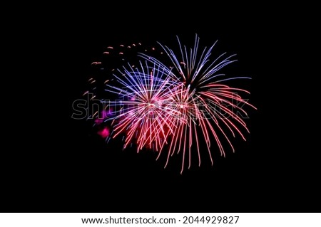 Similar – Image, Stock Photo Fireworks explode in two circles with yellow sparks from red smoke