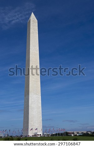 Tourists line up to visit the Washington Monument in Washington, D.C., USA.
