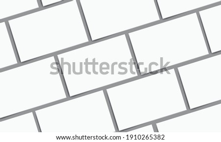 Top view from multiple business card templates.
Add a shadow and place it on a gray background.