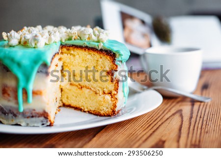Tea herbs with cake and book popcorn turquoise