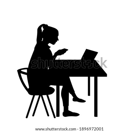 Beautiful woman working profile. Business woman using laptop and phone. Girl sitting at the table.