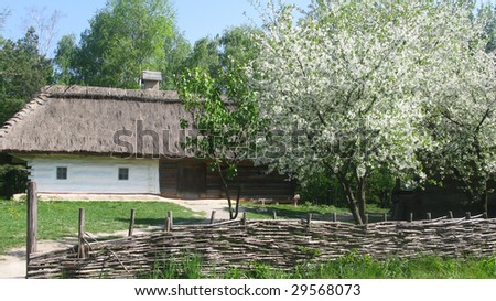 Country. Ukrainian country.  Wooden house. Wattled fence.