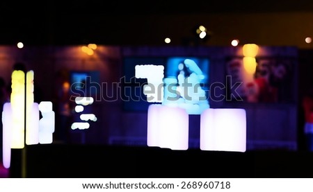 Dark Abstract blurry people in exhibition event hall