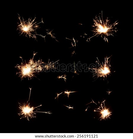 chrismas sparkler isolated on black set background six large fire sparks