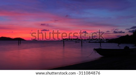 Similar – Image, Stock Photo Sunset on Thursday Island. In the golden glow, the water shines. In front a group of trees and behind a small island with passage to the sea.