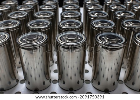 A consignment of new modern high-capacity lithium-ion cells. A prototype of new batteries on a laboratory table. Stok fotoğraf © 