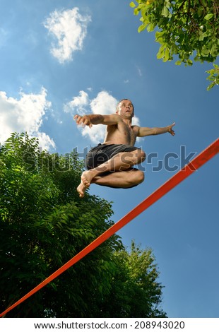 jump to a tightrope walker on a wire