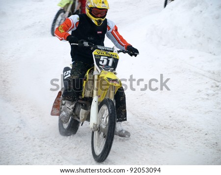 RIGA, LATVIA - JANUARY 7: Unidentified motocross rider at Winter motocross championship on Jan 7, 2011 at \