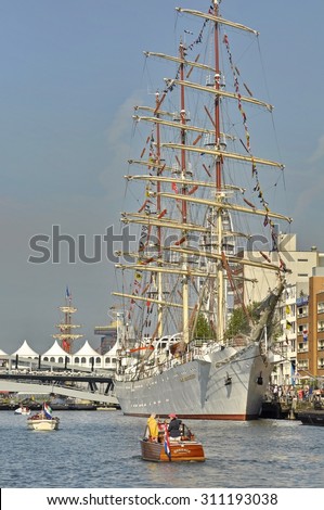 Port Amsterdam, Amsterdam, the Netherlands - August 20, 2015: The Dar Mlodziezy tall ship at the time of the SAIL (www.sail.nl), an international public nautical event held once in every 5 years.