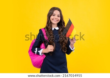 Education and learning in Germany, schooling in Europe. Deutschland, deutsche flag. Schoolgirl hold germany flag, study in Germany. Teen girl student. Stock foto © 