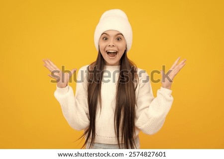 Similar – Image, Stock Photo Beautiful teenage girl opens a gift made of kraft paper tied with a red ribbon, new year mood. Holiday concept of Christmas and New Year at home.