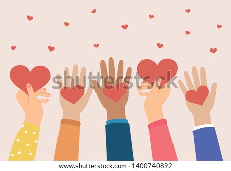 Hands holding a heart, give and share love to people concept.