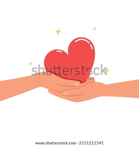 Hands holding red heart, Heart in hand, donation and charity concept.