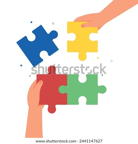 Hands holding puzzle pieces. Parts connect, putting multi color puzzle pieces together. work and business concept.