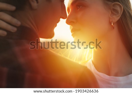 Similar – Image, Stock Photo Loving man and woman supporting each other while standing back to back