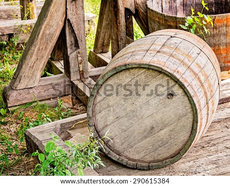 Old wood barrel on a square platform made of wood