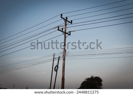 Similar – Image, Stock Photo Street, meadow with distribution box, facades of single-family houses, small town