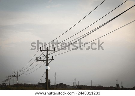 Similar – Image, Stock Photo Street, meadow with distribution box, facades of single-family houses, small town