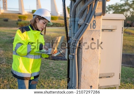 Telecommunication engineers work at cell towers for 5G cell phone signals,Network tower maintenance technicians 商業照片 © 