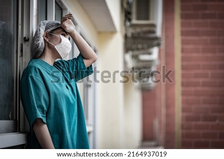 Similar – Image, Stock Photo hard working female doctor, heath care worker with face shield and mask in black and white