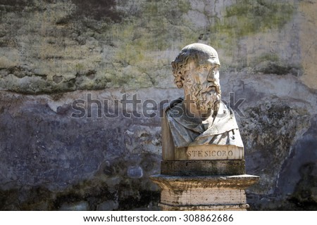 Statue of Stesicoro, Rome, Italy In a park on a hill above city center of Rome, there are many statues - busts of important personalities. One of them is bust of Stesicoro, the first great lyric poet.
