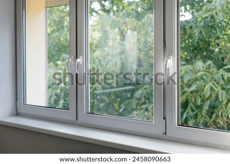 Similar – Image, Stock Photo Window with closed, green shutters in a red wall with plants in front of it