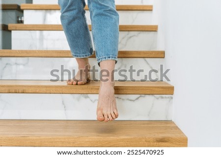 Similar – Image, Stock Photo Crop barefoot woman walking along seaside