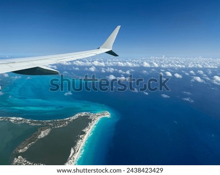 Similar – Image, Stock Photo Airplane landing above beautiful beach and sea background