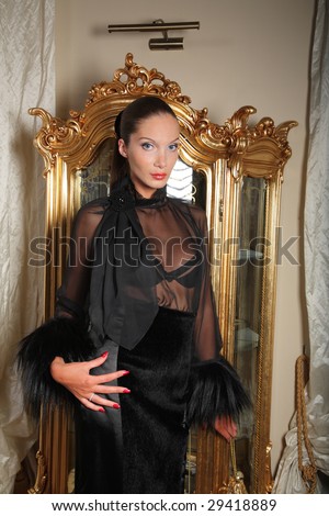 Young woman in luxury clothing